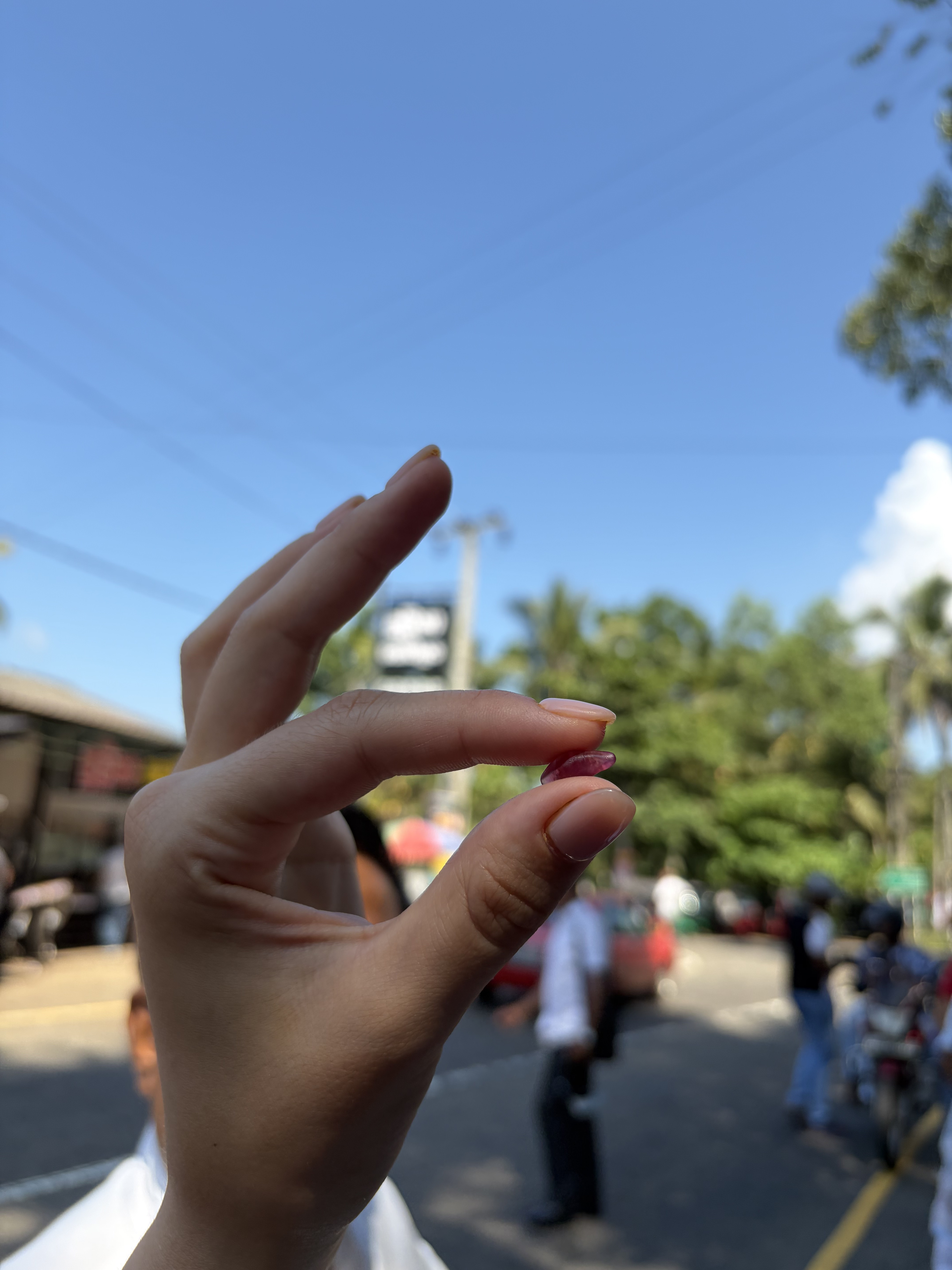 Holding a rough stone at the market